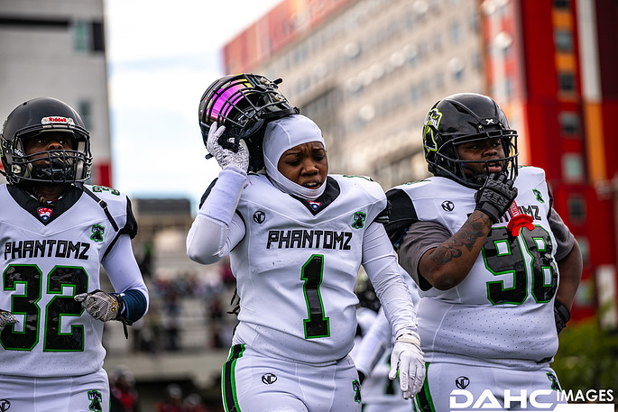 Phantomz players in white take the field